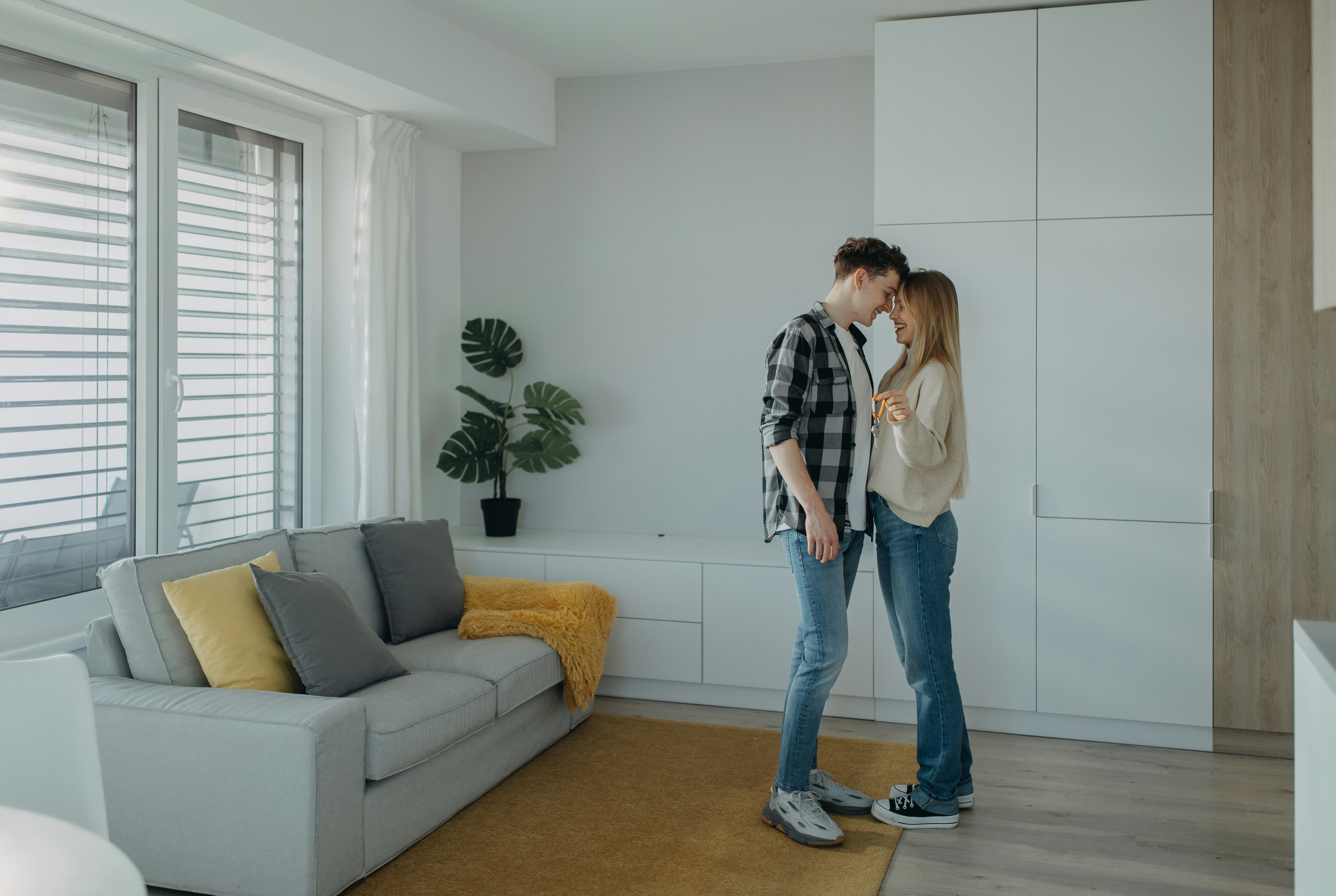 Couple relaxing in their modern Dutch apartment